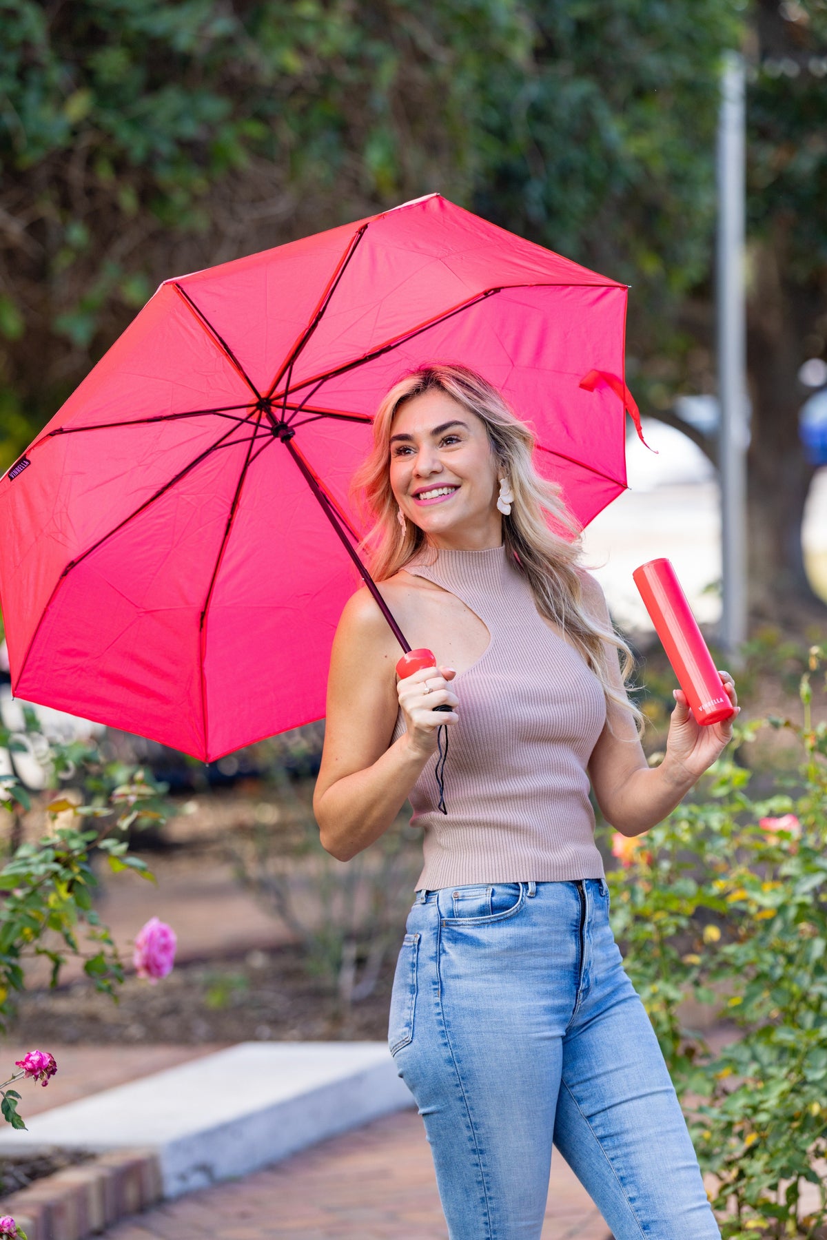 Pink Punch Bottle Umbrella lifestyle