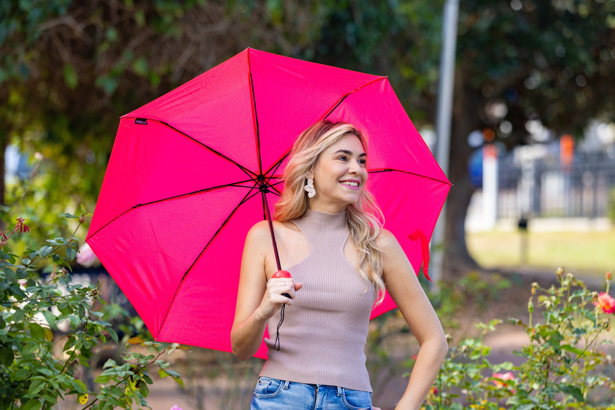 Pink Punch Bottle Umbrella lifestyle