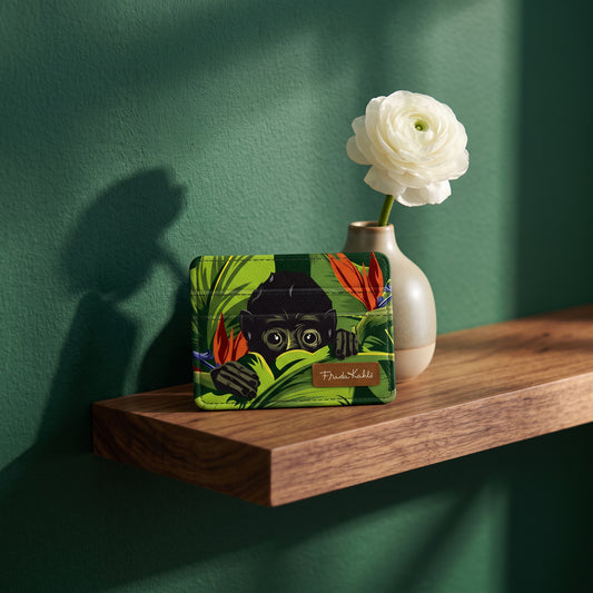 Monarque Frida Kahlo Monkey slim wallet card holder on wood shelf against green wall