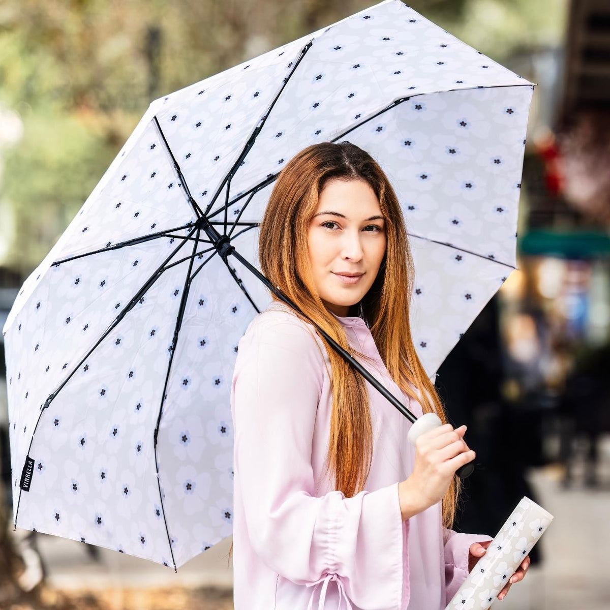 Nikki on Gray Water Bottle Umbrella — lifestyle